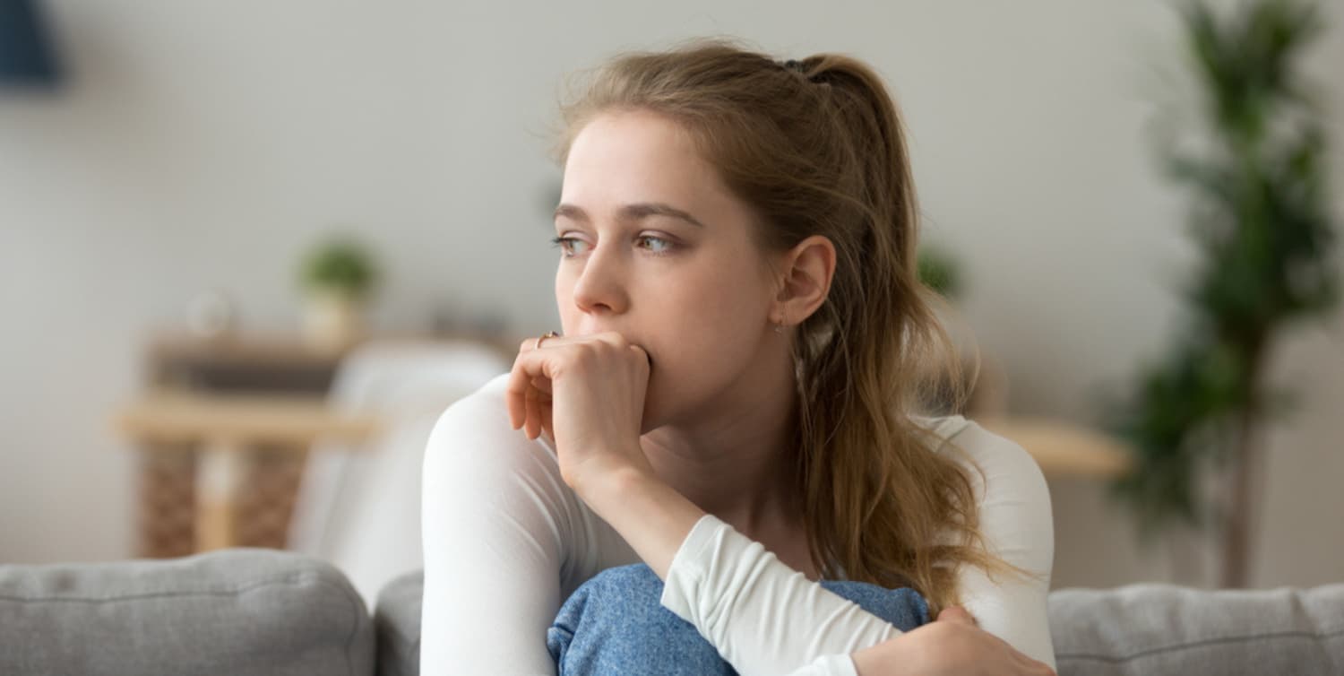 Overthinking young woman looking anxious and stressed
